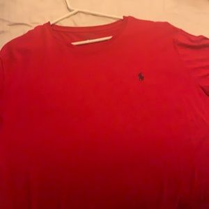 Never worn..Red extra large short sleeve polo t